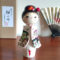 Handcrafted Japanese Kokeshi doll 'Sakura Komachi' by artist Yamagishi Masayoshi, featuring a kanzashi hair bun and a kimono with hand-painted pink and blue cherry blossoms. Available at j-okini.com in Malta