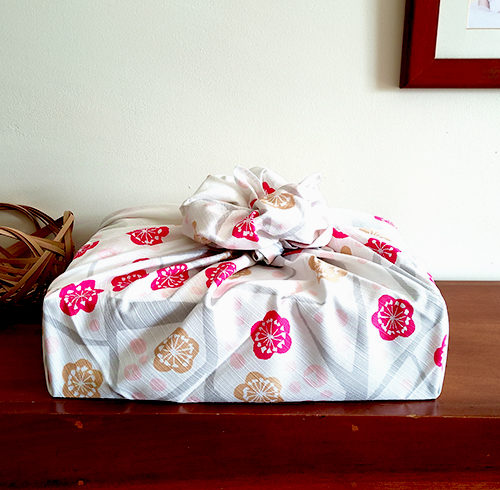 90cm Furoshiki wrapping cloth Edaume wapped in a flower knot. Available at j-okini malta