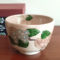 Handmade Kiyomizu-ware matcha bowl featuring pink and blue hydrangea flowers traced in gold, crafted by Kyoto artist Yagi Kaihou. Available at j-okini.com in Malta Europe.