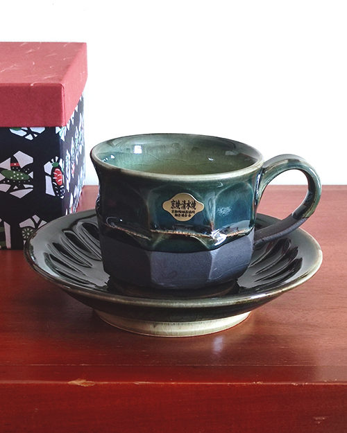 Handmade Kiyomizu Ware Coffee Cup and Saucer Set in deep Oribe green by Ando Mitsuru, showcasing texture contrasts and traditional Japanese craftsmanship.. Buy it from j-okini in Malta