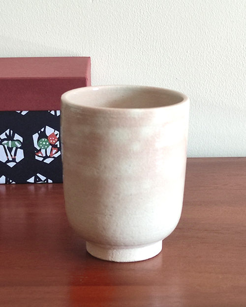 Kiyomizu-ware Yunomi tea cup featuring Red Fuji and crane design on a warm beige base with subtle orange-pink flecks. Available at j-okini.com in Malta