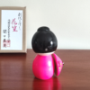 Kokeshi doll named Hanagasa by Sekiguchi Toua, wearing vivid pink kimono and holding an umbrella. j-okini.com in Malta