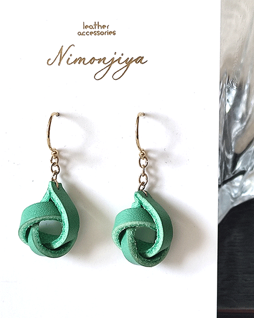 Handmade leather earrings with a delicate twist design in a traditional Japanese Hisui (jade green) color, showcasing Kyo-Yuzen dyeing craftsmanship. Gift idea from j-okini.com in Malta