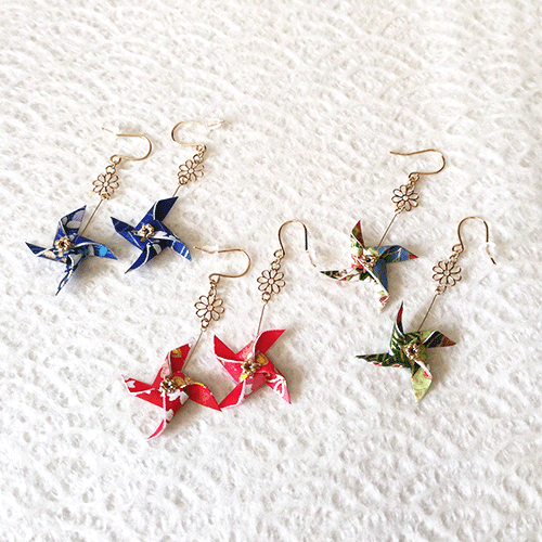 Washi Kazaguruma Earrings. Handcrafted with traditional Japanese Washi paper, these charming earrings feature a whimsical Kazaguruma (pinwheel) design. Available at j-okini.com in Malta