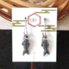 Handcrafted with a delicate, three-dimensional design in a shape of Koinobori Carp Streamer, each pair is painted in three vibrant, stained-glass-like colors. Handmade in Japan. Available at j-okini.com in Malta