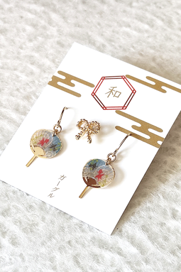Buy Japanese earring set including two mini uchiwa fan featuring a goldfish motif earrings with hooks , paired with a cute ribbon stud earring. Uchiwa fan has the desi Made in Japan! Available at j-okini.com in Malta