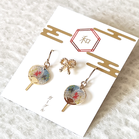 Buy Japanese earring set including two mini uchiwa fan featuring a goldfish motif earrings with hooks , paired with a cute ribbon stud earring. Uchiwa fan has the desi Made in Japan! Available at j-okini.com in Malta