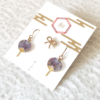 Buy Japanese earring set including two mini uchiwa fan featuring a vibrant fireworks (hanabi) pattern earrings with hooks , paired with a cute ribbon stud earring. Uchiwa fan has the desi Made in Japan! Available at j-okini.com in Malta