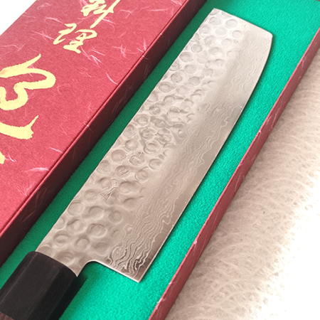 Handcrafted Japanese Nakiri kitchen knife with a hammered and wave-patterned AUS10 stainless steel blade, octagonal rosewood handle, and traditional craftsmanship. Available at j-okini in Malta