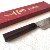 Handcrafted Japanese Nakiri kitchen knife with a hammered and wave-patterned AUS10 stainless steel blade, octagonal rosewood handle, and traditional craftsmanship. Available at j-okini in Malta