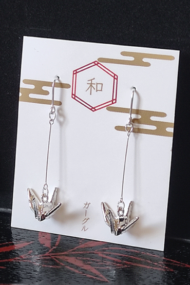 The origami crane, a symbol of peace, is beautifully captured in these earrings with a delicate, three-dimensional motif. Their minimalist design brings a subtle touch of Japanese culture, offering a graceful and elegant accent for any occasion.. Available at j-okini.com in Malta