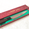 Japanese petty knife with a hammered AUS10 blade and octagonal Shitan rosewood handle. Available at j-okini in Malta