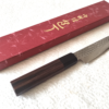 Japanese petty knife with a hammered AUS10 blade and octagonal Shitan rosewood handle. Available at j-okini in Malta