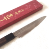 Japanese petty knife with a hammered AUS10 blade and octagonal Shitan rosewood handle. Available at j-okini in Malta