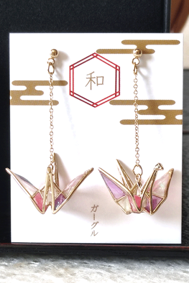 Buy Handmade Stained Glass Origami Crane Earrings, a symbol of peace, is beautifully captured in these earrings with a delicate, three-dimensional motif. Available at j-okini.com in Malta