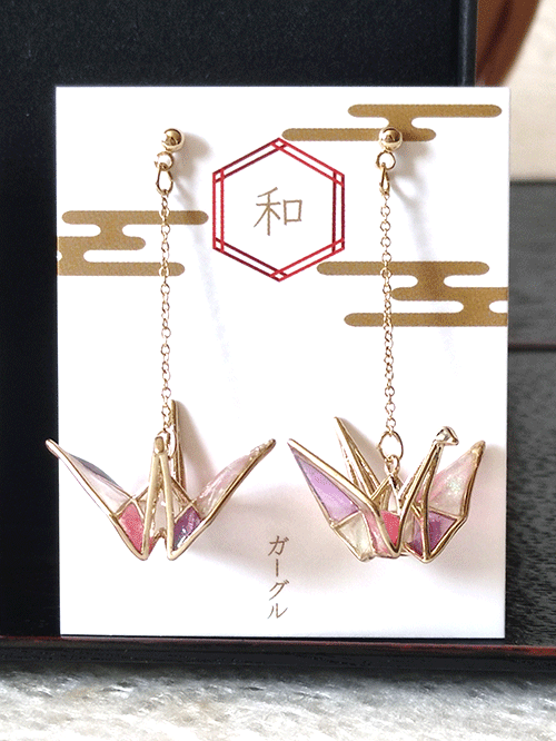 Buy Handmade Stained Glass Origami Crane Earrings, a symbol of peace, is beautifully captured in these earrings with a delicate, three-dimensional motif. Available at j-okini.com in Malta