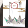 Buy Handmade Stained Glass Origami Crane Earrings, a symbol of peace, is beautifully captured in these earrings with a delicate, three-dimensional motif. Available at j-okini.com in Malta