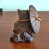 Vintage wooden tanuki (raccoon dog) figurine carved using the Ichii Itto Bori technique with removable hat, showcasing traditional Japanese craftsmanship and natural wood grain.