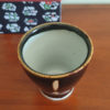 Kiyomizu-yaki free cup with Tenmoku glaze, smooth black surface with golden-brown rim and gold streaks, stamped with Kozou Kiln mark. Buy it from j-okini in Malta