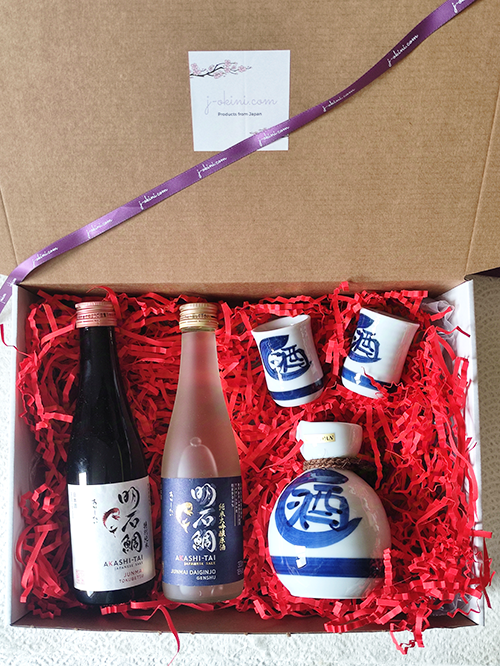 Complete sake gift set with premium sake bottles and ceramic sakeware, perfect for meals or special occasions. Available at j-okini.com in Malta