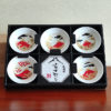 A 5-piece Sakazuki sake cup set featuring Red Fuji with intricate designs of cherry blossoms, waves, and autumn leaves, accented in gold and red for an elegant, celebratory touch. Available at j-okini.com in Malta