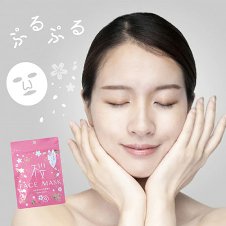 A pack of Kyoto Sakura Blossom Face Masks, featuring 7 sheets infused with hydrating and skin-brightening ingredients. Made in Japan, 100% cotton, and free from artificial coloring and mineral oil.