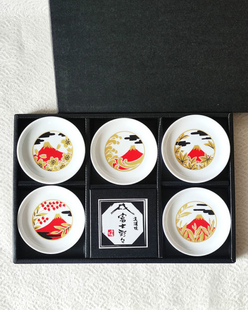 A 5-piece Red Fuji small dish set featuring intricate Japanese motifs like cherry blossoms, waves, and autumn leaves. Inspired by the rare and auspicious sight of Red Fuji. Made in Japan, perfect for condiments or soy sauce. Available at j-okini.com in Malta