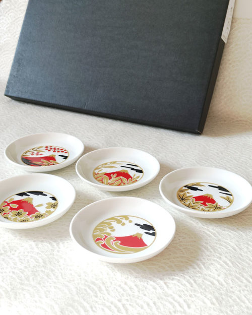 A 5-piece Red Fuji small dish set featuring intricate Japanese motifs like cherry blossoms, waves, and autumn leaves. Inspired by the rare and auspicious sight of Red Fuji. Made in Japan, perfect for condiments or soy sauce. Available at j-okini.com in Malta