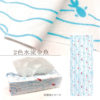 A traditional Japanese Tenugui towel with Komon' (小紋) pattern with Kingyo (goldfish) and flowing water in two colors, made from breathable cotton. Crafted in Japan for versatile everyday use. Shown in close-up, flat, and wrapped around a tissue box. Available at j-okini.com in Malta