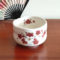 Small Mino ware Matcha bowl with a cream glaze and delicate white and red plum blossom design, perfect for enhancing the beauty of Matcha. Available at j-okini.com in Malta