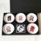 A set of five Japanese Maneki-Neko small dishes, each featuring a unique beckoning cat design symbolizing luck, protection, happiness, prosperity, and wealth. Perfect for serving soy sauce or condiments. Made in Japan. Available at j-okini.com in Malta