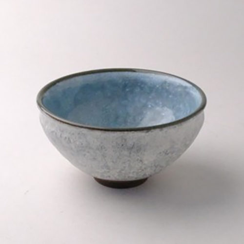 Mino ware Tenmoku Matcha bowl in light blue, featuring a smooth interior, rough-textured exterior, and a traditional curved rim. A perfect choice for Matcha lovers. Available at j-okini.com in Malta