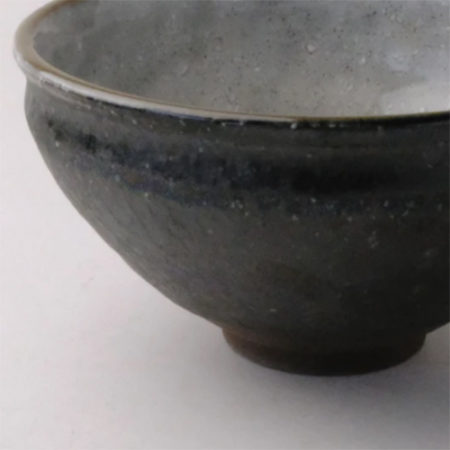 Mino ware Tenmoku Matcha bowl in grey tone, featuring a smooth interior, rough-textured exterior, and a traditional curved rim. Available at j-okini.com in Malta