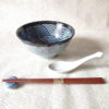 A beautifully curated Japanese donburi set featuring a Seigaiha-patterned bowl, white porcelain spoon, premium wooden chopsticks made of Keyaki wood, and a matching chopstick rest. Ideal for Japanese cuisine lovers and gift-giving. Available at j-okini.com in Malta