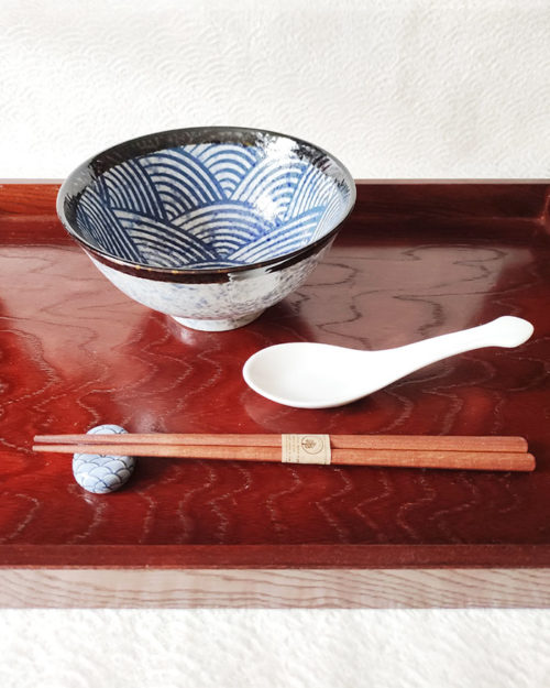 A beautifully curated Japanese donburi set featuring a Seigaiha-patterned bowl, white porcelain spoon, premium wooden chopsticks made of Keyaki wood, and a matching chopstick rest. Ideal for Japanese cuisine lovers and gift-giving. Available at j-okini.com in Malta