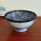 A traditional Japanese Mino ware donburi bowl featuring a deep blue Seigaiha wave pattern. With a 600ml capacity, 16cm diameter, and 8cm height, it's ideal for rice dishes, udon, or instant noodles. Beautifully crafted with a smooth glaze, showcasing the elegance of Japanese ceramics. Made in Japan. Available at j-okini.com in Malta