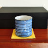 rock glass in blue with a mustard fabric coaster. Made in Japan. Available at j-okini.com in Malta