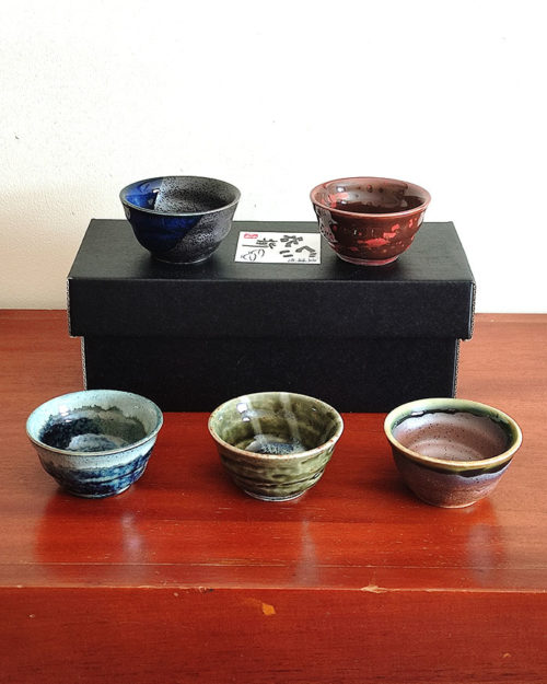 A set of five uniquely glazed Japanese sake cups, each with a different color and finish. Perfect for entertaining or gifting. Made in Japan. Available at j-okini.com in Malta