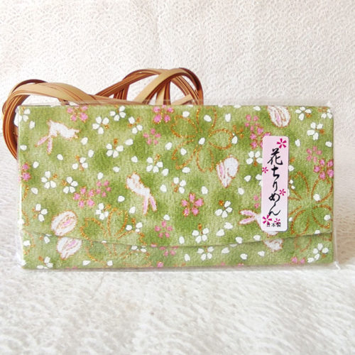 A Hana Chirimen Kimono Wallet with a bunny and sakura pattern in green, featuring a fold-over design. Made from Kyoto's traditional Chirimen fabric. Available at j-okini.com in Malta
