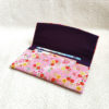 Fold-over chirimen wallet with sakura motifs in pink—lightweight, stylish, and made in Japan. Available at j-okini.com in Malta